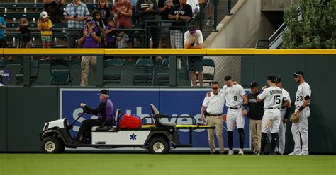 Rockies rookie Brenton Doyle carted off field after crashing into center field wall in 9th inning vs Marlins